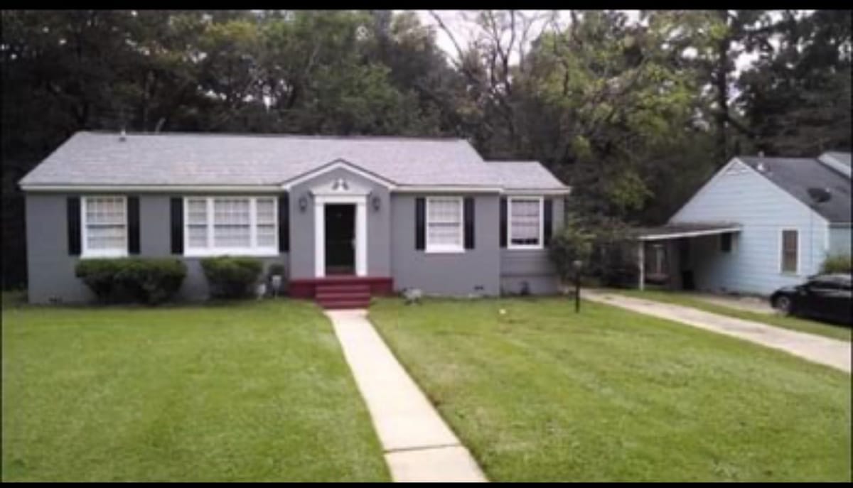 Trimmed yard with a clear front walkway