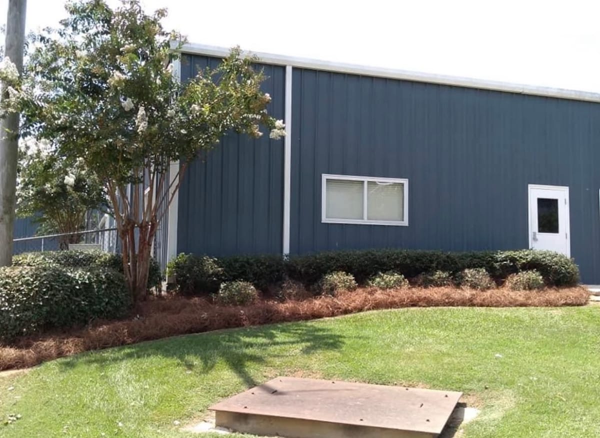 Trimmed shrubs and a fresh mulch bed